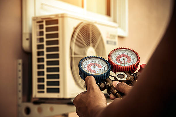 Professional Hvac Maintenance technician working in Key Biscayne, FL